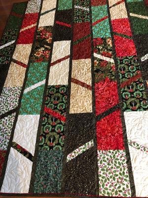 Patrice Krant's quilt is Gudrun Erla's quarantine-along quilt called "Elvira."  Since Patrice did hers in Christmas colors, she renamed hers "Elf-vira"!